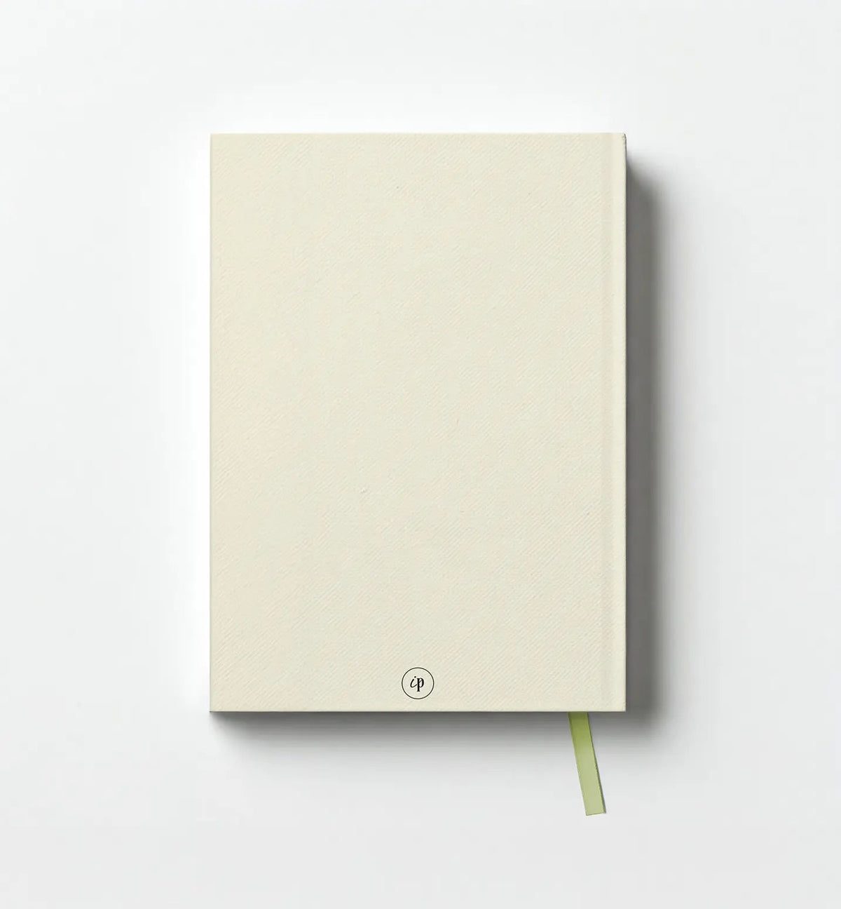 Back cover of the beige Be Present journal, showing the in Perennial monogram and green ribbon bookmark.