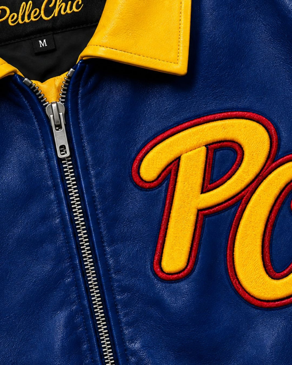 Pelle Chic Eagle Volt jacket — chest monogram and zipper detail