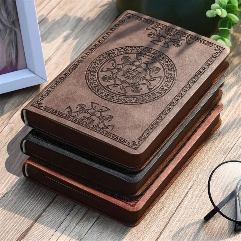 Stack of brown, black, and red A6 Vintage Pocket Notebooks