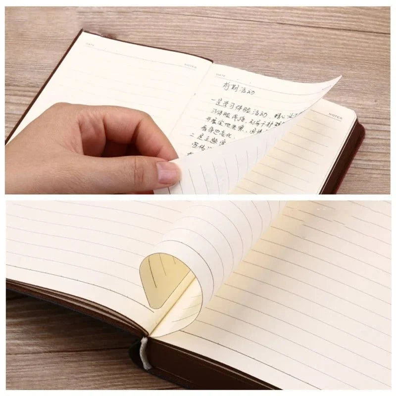 Open A6 Vintage Pocket Notebook with lined pages being turned